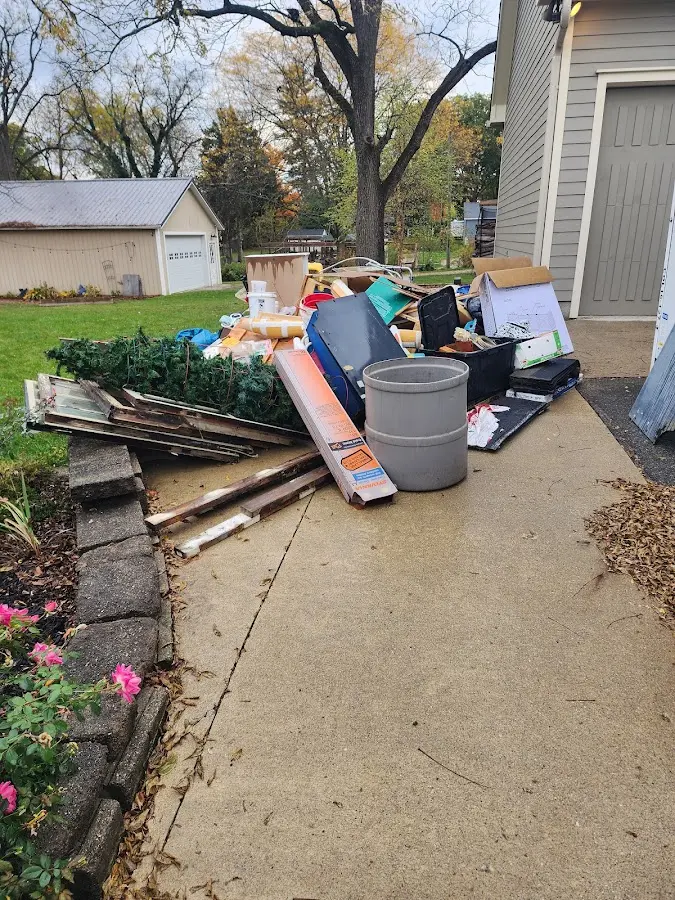 Dumpster being loaded with debris for Residential Dumpster Rental in Ilion